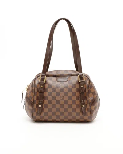 Pre-owned Louis Vuitton Damier Ebene Rivington Pm Bag In Brown