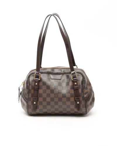 Pre-owned Louis Vuitton Damier Ebene Rivington Pm Bag In Brown