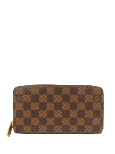 Pre-owned Louis Vuitton Damier Zip-around Wallet In Brown
