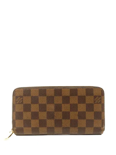 Pre-owned Louis Vuitton Damier-pattern Long Wallet In Brown
