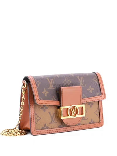 Pre-owned Louis Vuitton Dauphine Chain Wallet Reverse Monogram Canvas Clutch Bag In Brown