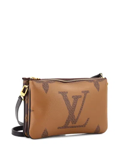 Pre-owned Louis Vuitton Double Zip Pochette Reverse Monogram Giant Clutch Bag In Brown