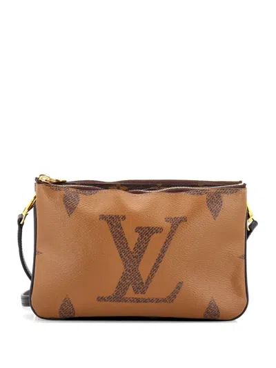 Pre-owned Louis Vuitton Double Zip Pochette Reverse Monogram Giant Clutch Bag In Brown