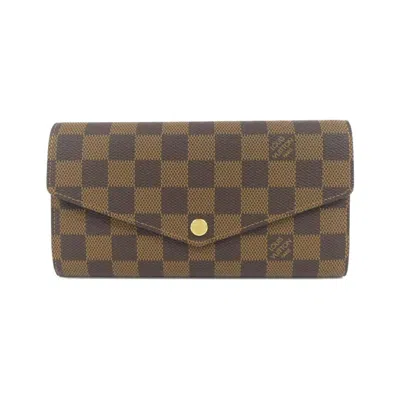 Pre-owned Louis Vuitton Ebene Coated Canvas Long Wallet (bi-fold) () In Brown