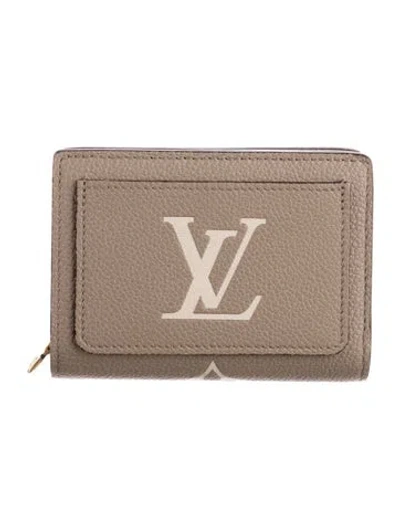 Pre-owned Louis Vuitton Empreinte Leather Bifold Wallet In Neutrals
