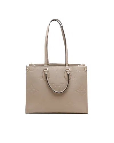 Louis Vuitton Empreinte Onthego Mm Bag In Brown