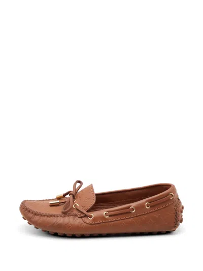 Pre-owned Louis Vuitton Gloria Monogram Empreinte Loafers In Brown