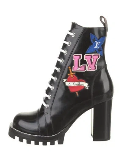 Pre-owned Louis Vuitton Leather Printed Combat Boots In Black
