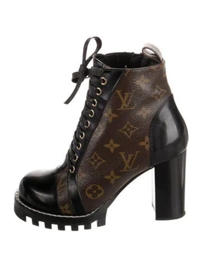 Pre-owned Louis Vuitton Leather Printed Combat Boots In Black