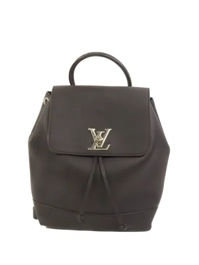 Pre-owned Louis Vuitton Lock Me Backpack In Black