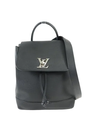 Pre-owned Louis Vuitton Lock Me Leather Backpack In Black