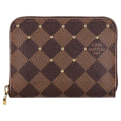 Pre-owned Louis Vuitton Ltd Edition Damier Ebene Studded Zippy Coin Purse In Black