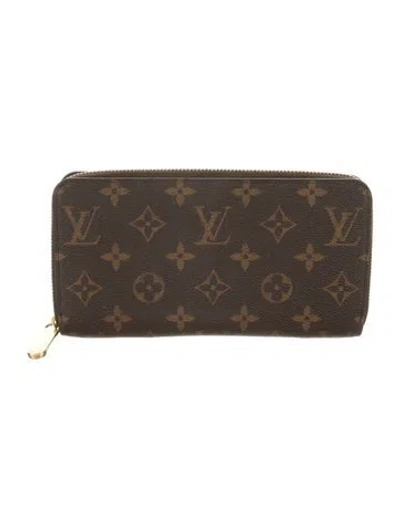 Pre-owned Louis Vuitton Lv Monogram Coated Canvas Zippy Wallet In Brown