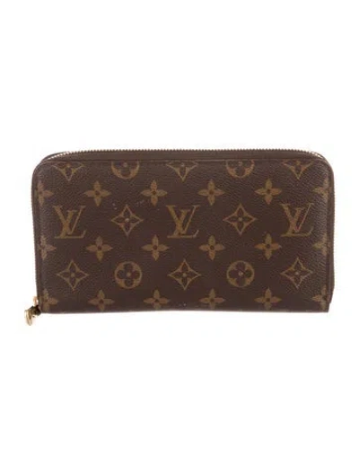 Pre-owned Louis Vuitton Lv Monogram Coated Canvas Zippy Wallet In Brown