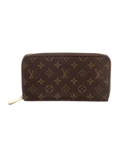 Pre-owned Louis Vuitton Lv Monogram Coated Canvas Zippy Wallet In Brown