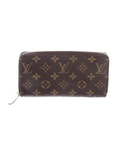 Pre-owned Louis Vuitton Lv Monogram Coated Canvas Zippy Wallet In Brown