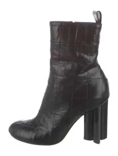 Pre-owned Louis Vuitton Lv Monogram Embossed Leather Chelsea Boots In Black