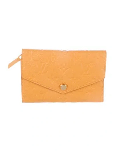 Pre-owned Louis Vuitton Lv Monogram Empreinte Leather Sarah Wallet In Yellow