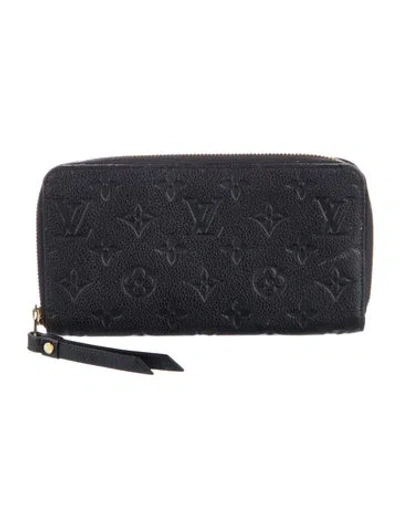 Pre-owned Louis Vuitton Lv Monogram Empreinte Leather Zippy Wallet In Blue