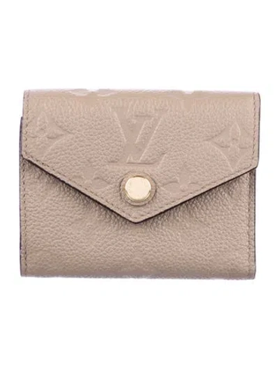 Pre-owned Louis Vuitton Lv Monogram Empreinte Leather Zoé Wallet In Neutral