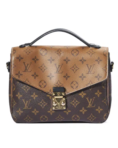 Pre-owned Louis Vuitton Metis Mm Monogram Reverse Clutch In Brown