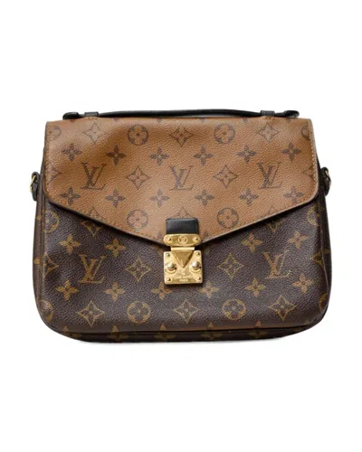 Pre-owned Louis Vuitton Metis Mm Reversible Monogram Clutch In Brown