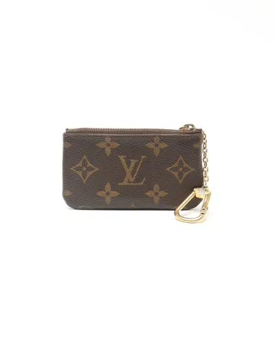 Louis Vuitton Monogram Coin Purse In Brown