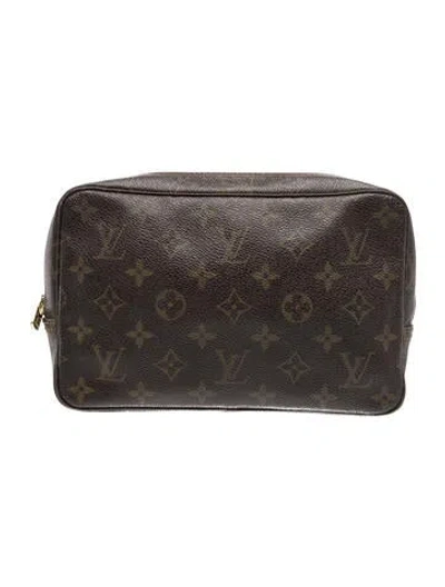 Pre-owned Louis Vuitton Monogram Cosmetic Bag. In Brown