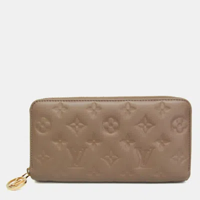 Pre-owned Louis Vuitton Monogram Embossed Coussin Taupe Beige Lambskin Long Wallet In Sand