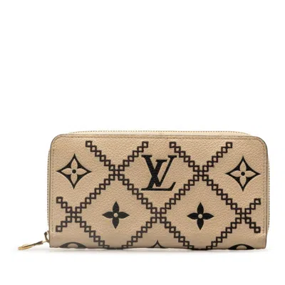 Pre-owned Louis Vuitton Monogram Empreinte Beige Monogram Leather Wallet (bi-fold) () In Beige, Monogram