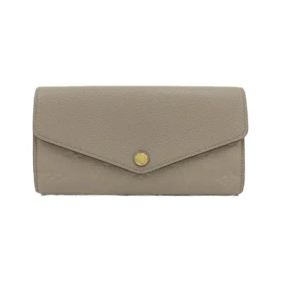 Pre-owned Louis Vuitton Monogram Empreinte Beige Tourterelle Leather Long Wallet (bi-fold) () In Beige, Tourterelle