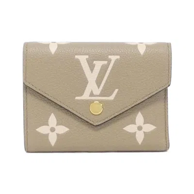 Pre-owned Louis Vuitton Monogram Empreinte Tourterelle Leather Wallet (bi-fold) () In Gray