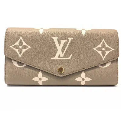 Pre-owned Louis Vuitton Monogram Empreinte Tourterelle Monogram Empreinte Long Wallet (bi-fold) () In Gray