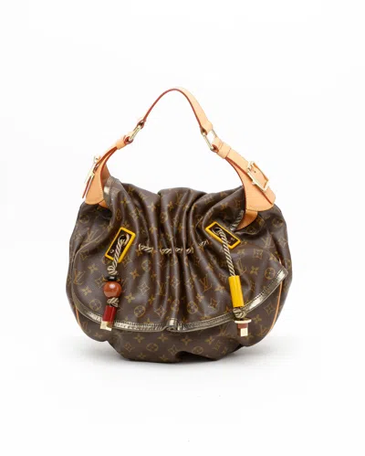 Pre-owned Louis Vuitton Monogram Kalahari Gm Bag In Brown