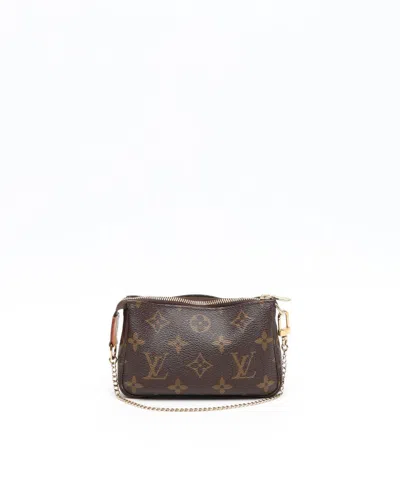 Pre-owned Louis Vuitton Monogram Mini Pochette Accessoires Bag In Brown
