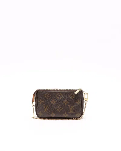 Pre-owned Louis Vuitton Monogram Mini Pochette Accessories Bag In Brown