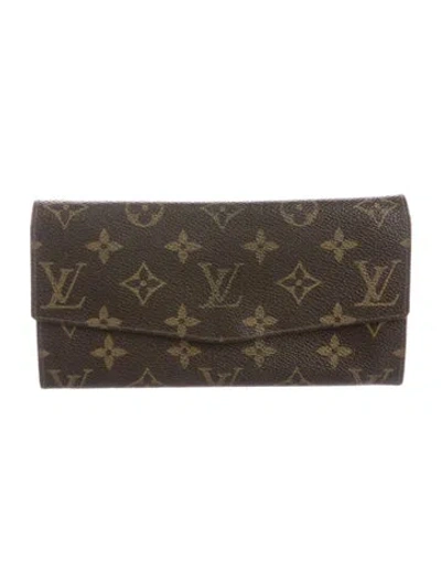 Pre-owned Louis Vuitton Monogram Pattern Coated Canvas International Wallet In Brown