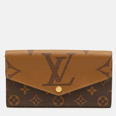 Pre-owned Louis Vuitton Monogram Reverse Giant Canvas Sarah Wallet In Brown