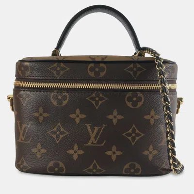 Pre-owned Louis Vuitton Monogram Reverse Vanity Pm In Brown