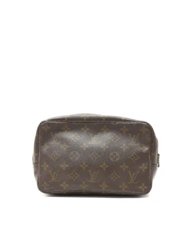 Louis Vuitton Monogram Trousse Toilette In Brown