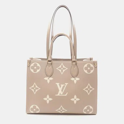 Pre-owned Louis Vuitton On The Go Mm Bicolor Monogram Empreinte Tourterelle Creme Tote Bag Leather Beige Ivory In Sand