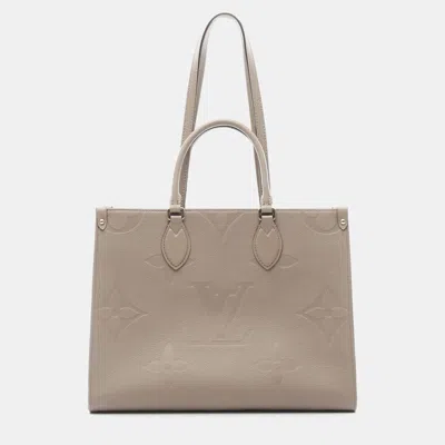 Pre-owned Louis Vuitton On The Go Mm Monogram Empreinte Beige Leather Tote In Sand