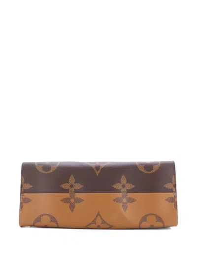 Pre-owned Louis Vuitton Onthego Reverse Monogram Giant Gm Tote Bag In Brown