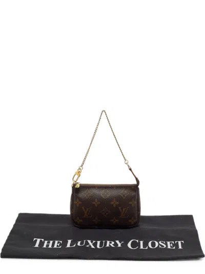 Pre-owned Louis Vuitton Pochette Accessoires Monogram Canvas Mini Bag In Brown