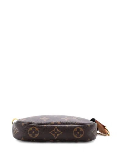 Pre-owned Louis Vuitton Pochette Accessoires Monogram Canvas Mini Clutch Bag In Brown