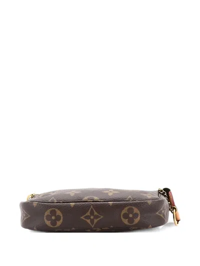Pre-owned Louis Vuitton Pochette Accessoires Monogram Canvas Mini Clutch Bag In Brown