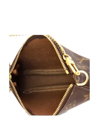 Pre-owned Louis Vuitton Pochette Accessoires Monogram Canvas Mini Clutch Bag In Brown