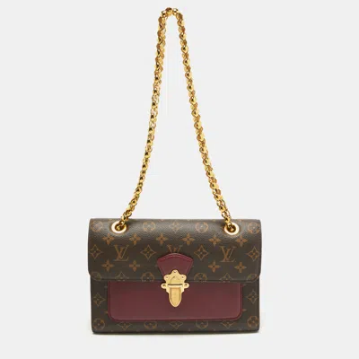 Pre-owned Louis Vuitton Raisin Monogram Canvas Victoire Bag In Brown