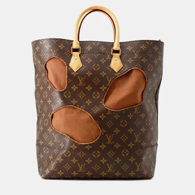Pre-owned Louis Vuitton Rei Kawakubo Bag With Holes Monogram Canvas Tote Bag In Brown