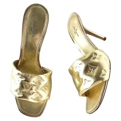 Pre-owned Louis Vuitton Revival Monogram Emboss Gold Leather Heeled Mules Sandals 38.5 In Brown